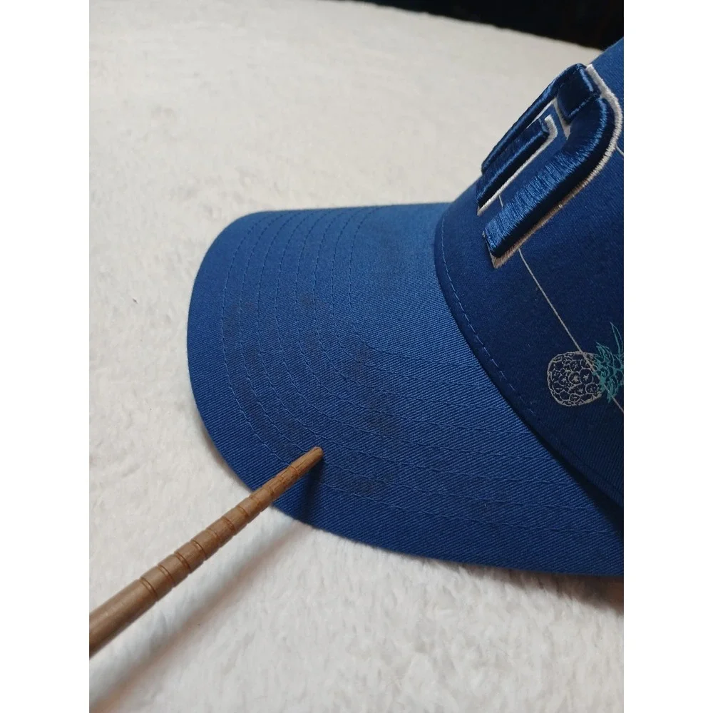 Travis Mathew Blue Pineapple Print Yupoong Adjustable Trucker Hat